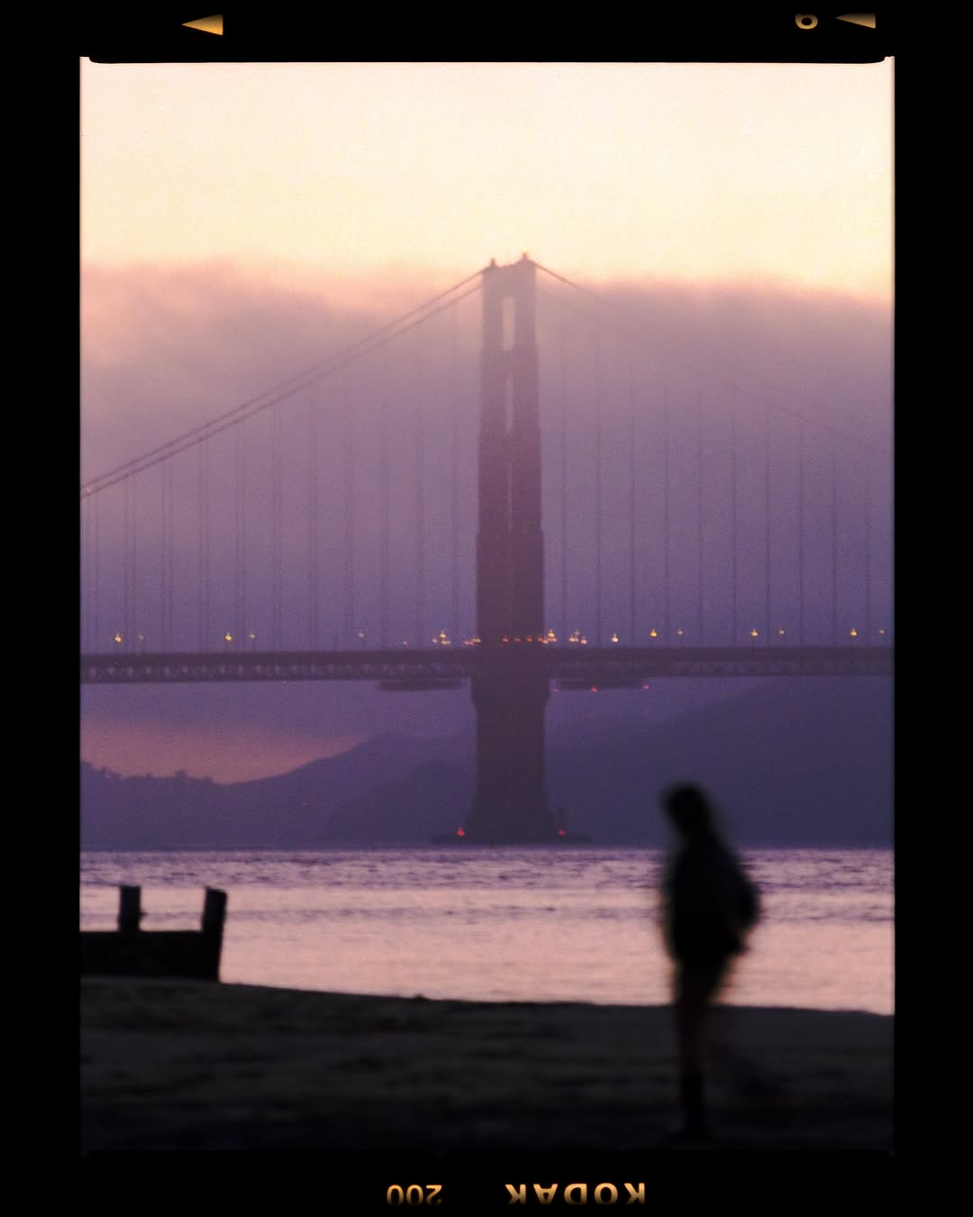 Where the sea meets silence, and the bridge fades into dreams. 🎞️💜

📸 #hasselblad205tcc
🎞️ #kodakgold200 
📍#sanfransisco 
🧪 Developed and scanned by myself 
#shootfilmmag #loadfilm #photocinematica #magazine35mm #stademagazine #filmphotography #filmtweakers #shootitwithfilm #thefilmsorority #filmforall #shootfilmstaybroke#photocinematica #magazine35mm #kodak #kodakprofessional #kodak #kodakprofessional #hummingmag #kodakphotography #kodakmoments #kodakfilm #madewithkodak